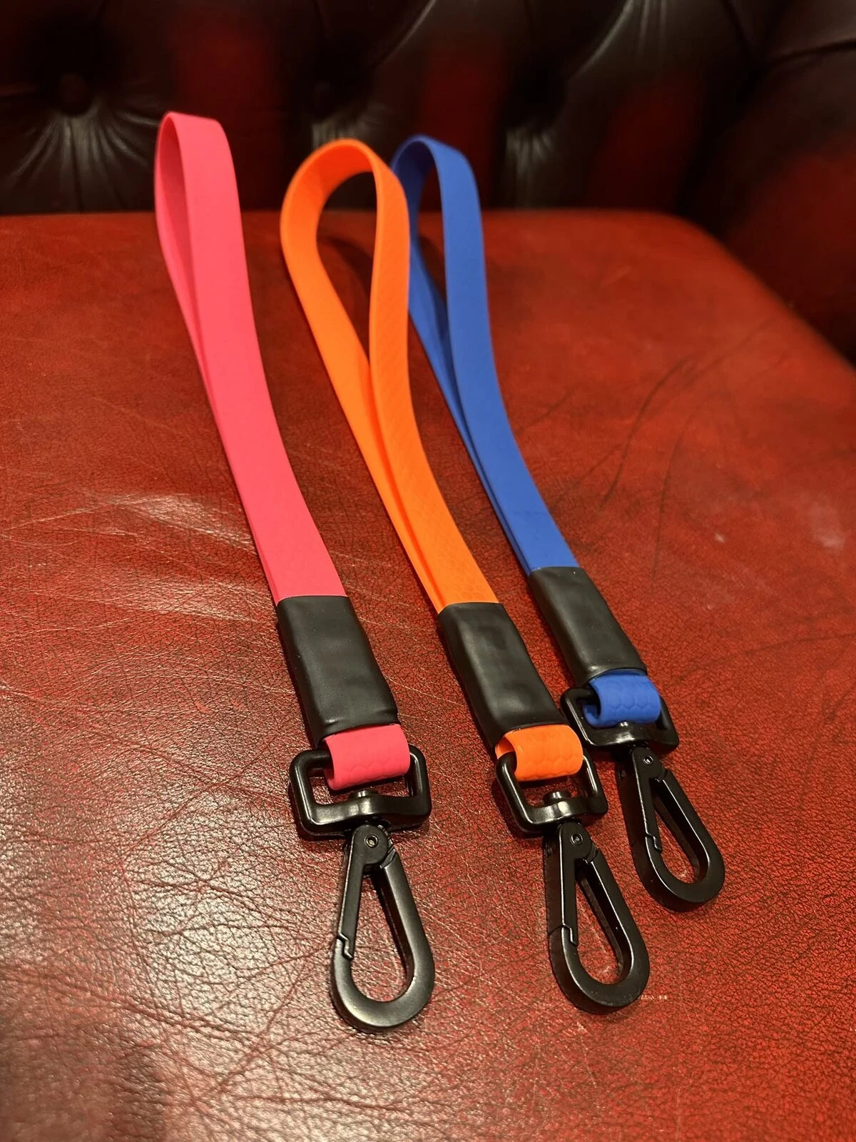 Red, orange and blue traffic handles with clips